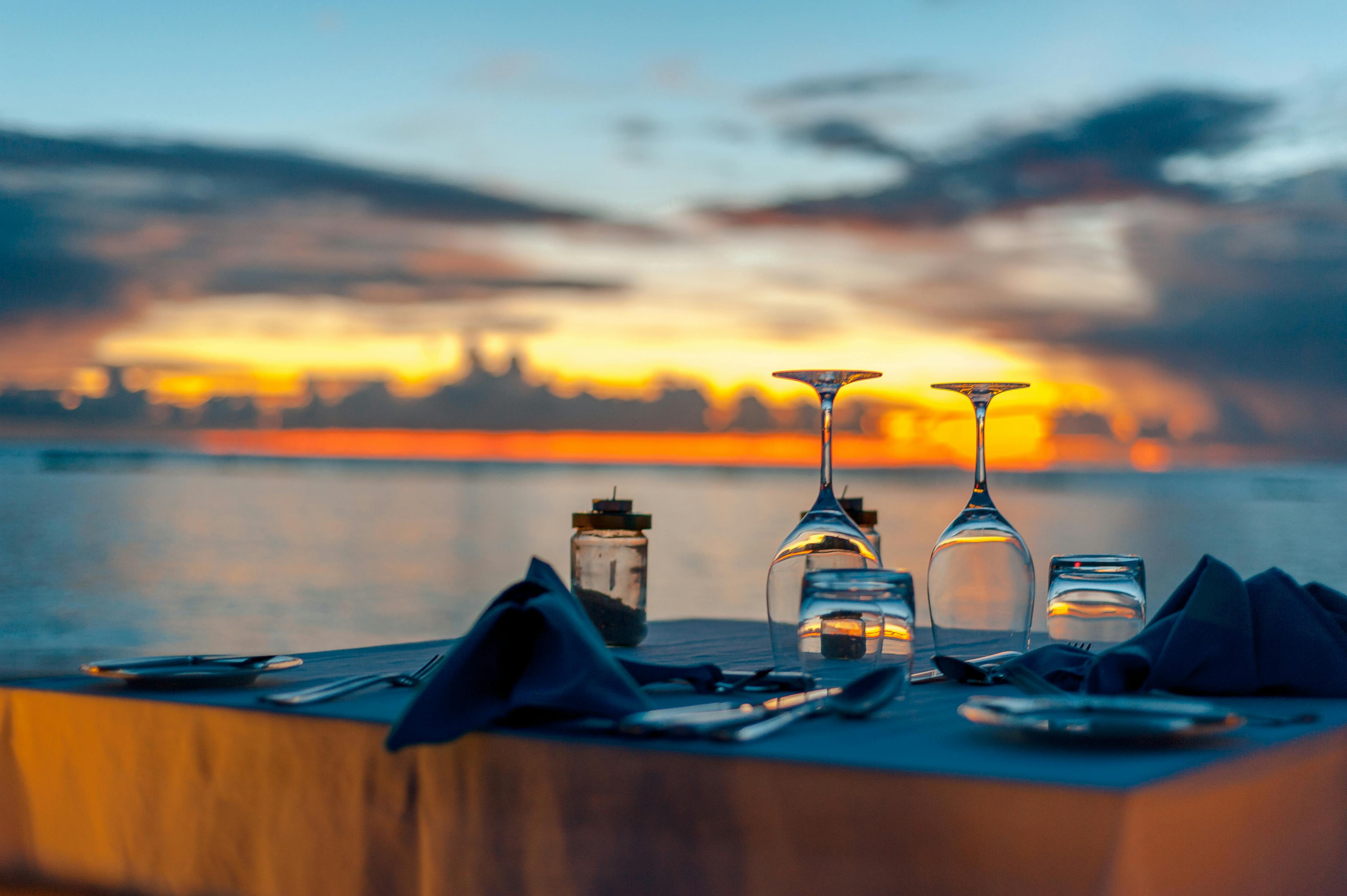 Sundowner dining on the Nauti deck at golden hour